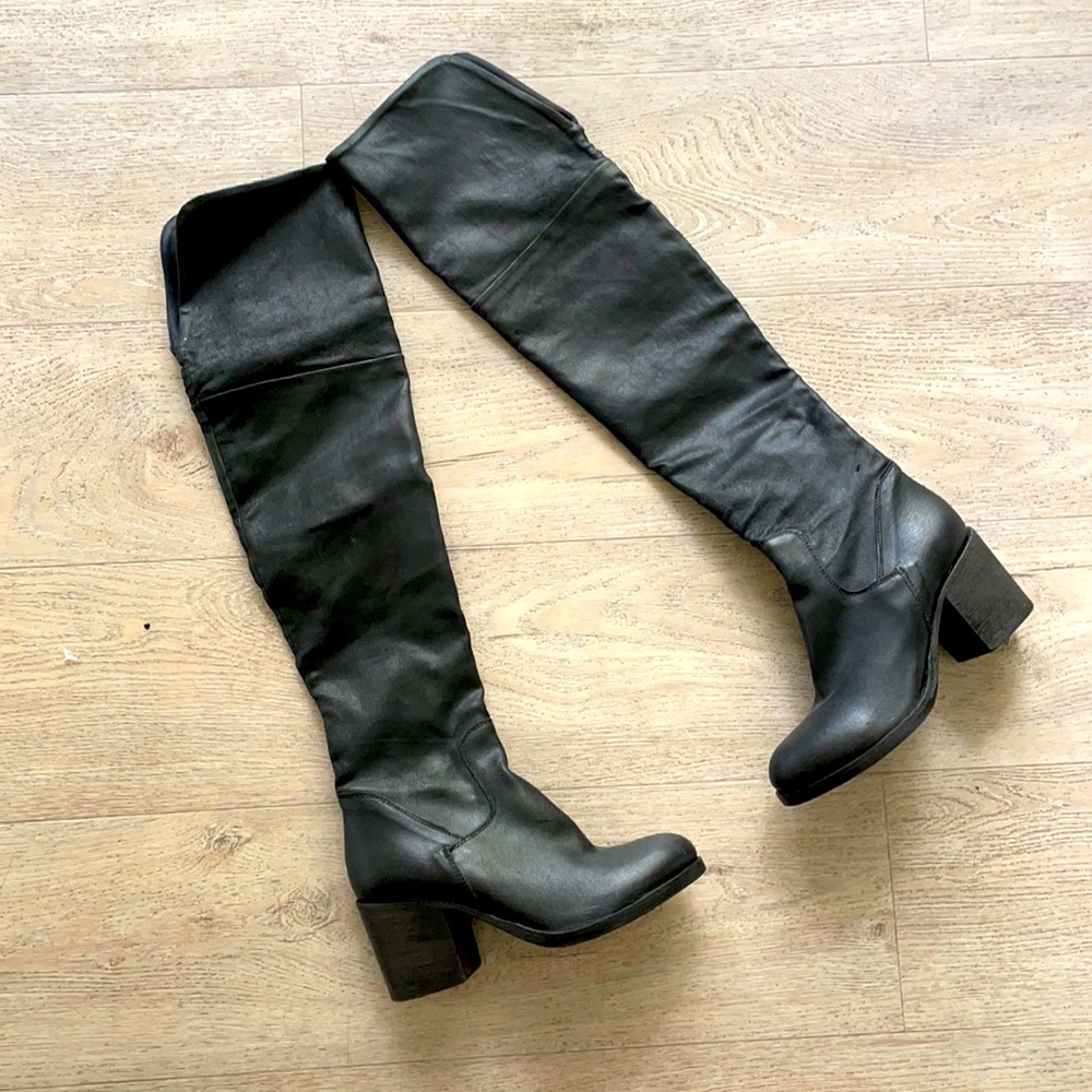 Black leather thigh high boots